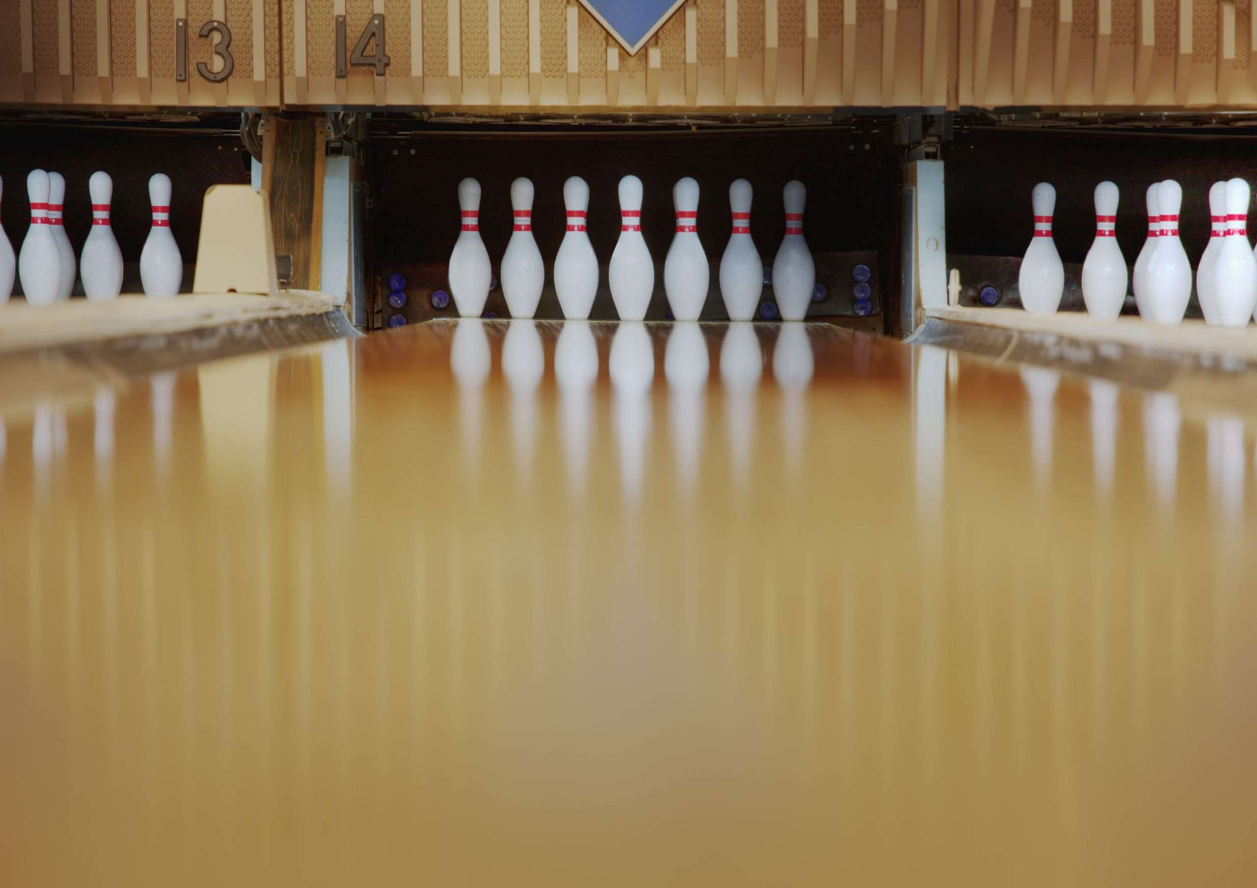 Edmonds, Washington, USA,Bowling pins reflecting in bowling alley lane
